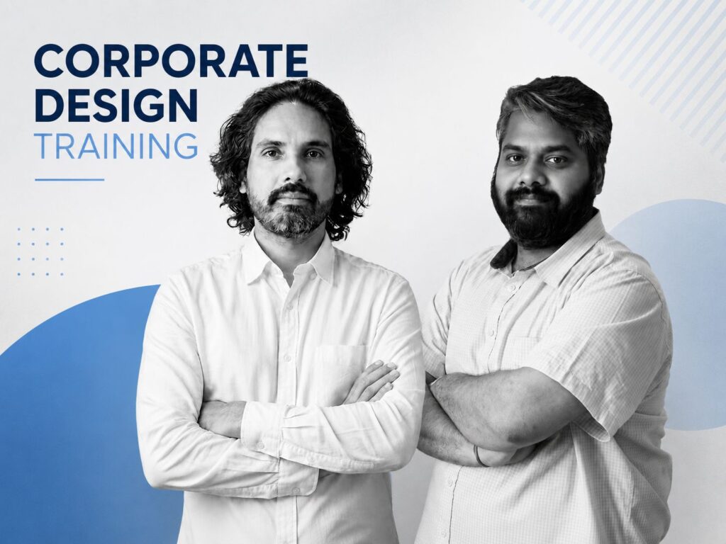 Two men in white shirts pose with arms crossed for a corporate design training banner, blue geometric shapes in the background.